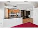 Bright and open living area with a modern kitchen featuring stainless steel appliances and a functional layout at 891 14Th St # 2105, Denver, CO 80202