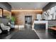 A modern lobby with tile flooring, wood accent wall, seating, and a white reception desk at 891 14Th St # 2105, Denver, CO 80202