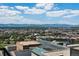 Expansive mountain view from the building, showing the city skyline and snow-capped peaks on the horizon at 891 14Th St # 2105, Denver, CO 80202