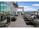 Rooftop terrace featuring multiple grilling stations and seating areas for outdoor entertaining at 891 14Th St # 2105, Denver, CO 80202