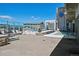 The building's rooftop boasts a luxurious pool, comfortable seating, and stunning city views with mountain backdrop at 891 14Th St # 2105, Denver, CO 80202