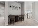 Inviting hallway landing area with a built-in desk, sconces and a view of the stairwell at 11522 Trona Ct, Parker, CO 80138