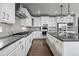 Bright kitchen featuring expansive countertops, modern appliances, and ample cabinet space at 11522 Trona Ct, Parker, CO 80138