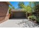 Detached garage with a concrete driveway and easy access; some green landscaping is visible at 1278 Dexter St, Denver, CO 80220