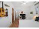 Bedroom with hardwood floors, desk, and two monitors creating a great work-from-home space at 4429 Winona Ct, Denver, CO 80212