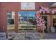 Charming brick storefront decorated with pink floral arrangements at 4429 Winona Ct, Denver, CO 80212