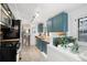 Stylish kitchen with stainless steel appliances, butcher block counters, and plenty of cabinet space at 4429 Winona Ct, Denver, CO 80212