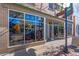 An attractive retail storefront featuring large display windows and brick accents at 4429 Winona Ct, Denver, CO 80212