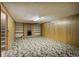 A spacious basement featuring a fireplace and neutral colors at 1971 Kerr Gulch Rd, Evergreen, CO 80439