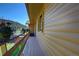 Outdoor porch with potted plants and wood paneling at 1971 Kerr Gulch Rd, Evergreen, CO 80439