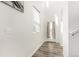 Entryway with large window and hardwood flooring at 803 N Bently St, Watkins, CO 80137