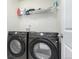 Efficient laundry area equipped with modern washer and dryer appliances for convenience at 803 N Bently St, Watkins, CO 80137