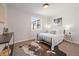 Comfortable bedroom with neutral tones, window view, and stylish accents at 3200 N Elizabeth St, Denver, CO 80205