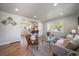 Bright, open-concept living room with modern decor, wood floors, and plenty of natural light at 3200 N Elizabeth St, Denver, CO 80205