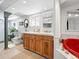 Bright bathroom featuring double sinks and a soaking tub at 1451 S Columbine St, Denver, CO 80210