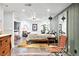 Spacious basement bedroom with decor, vibrant rugs, and modern lighting at 1451 S Columbine St, Denver, CO 80210