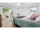 Bright bedroom with neutral carpet and two windows at 1451 S Columbine St, Denver, CO 80210