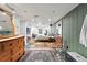 Spacious basement bedroom with decor, vibrant rugs, and modern lighting at 1451 S Columbine St, Denver, CO 80210