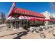 Exterior view of a charming ice cream shop with a retro design and inviting outdoor seating at 1451 S Columbine St, Denver, CO 80210