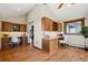 Spacious home office featuring custom wood built-ins, desks, and hardwood floors, perfect for remote work at 3021 N Lakeridge Trl, Boulder, CO 80302