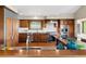 Gourmet kitchen features modern appliances, custom cabinets, and ample counter space at 3021 N Lakeridge Trl, Boulder, CO 80302
