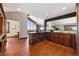 Spacious kitchen with a brick island, wooden cabinets, and hardwood floors at 3021 N Lakeridge Trl, Boulder, CO 80302
