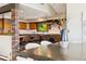 Kitchen featuring wooden cabinets, marble countertops, and a brick oven range at 3021 N Lakeridge Trl, Boulder, CO 80302