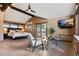 Serene main bedroom with vaulted ceiling, sitting area, and sliding door that provides outdoor access at 3021 N Lakeridge Trl, Boulder, CO 80302
