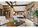 Inviting main bedroom featuring vaulted ceilings, a walk-in closet, and a private balcony access at 3021 N Lakeridge Trl, Boulder, CO 80302