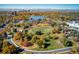 Scenic aerial view of a beautiful park in the city during autumn with colorful trees and tranquil lakes at 3674 Dexter St, Denver, CO 80207