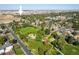 Aerial view of neighborhood park offering green space and recreational amenities to the community at 3674 Dexter St, Denver, CO 80207