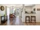 Spacious and well-lit living area with a combined dining and kitchen space at 3674 Dexter St, Denver, CO 80207