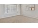 Bedroom with neutral carpet and large window for natural light at 401 W Prestwick Way, Castle Rock, CO 80104