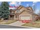 Charming two-story home featuring a new roof, a 3 car tandem garage and a well-manicured lawn at 401 W Prestwick Way, Castle Rock, CO 80104