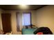 Bedroom with neutral walls, natural light, and a closet at 160 Utica St, Denver, CO 80219