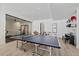 Entertaining game room with ping pong table, piano, drums, and access to a private gym at 5263 Creation Rock Trl, Morrison, CO 80465