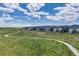 A picturesque view of the new homes along a greenbelt and walking path at 8517 Eckley St, Littleton, CO 80125