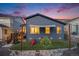 Enjoy this home's backyard with its small playset, privacy shade, patio and great views of the sunset at 8517 Eckley St, Littleton, CO 80125