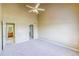 The main bedroom features a private bathroom and a walk-in closet at 9585 Pearl Cir # 203, Parker, CO 80134
