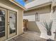 Cozy outdoor patio features concrete pavers and charming decor, perfect for relaxing or entertaining at 5155 W Quincy Ave # J103, Denver, CO 80236