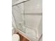 Bathroom with a shower/tub and white tiled walls at 2354 S Troy St, Aurora, CO 80014