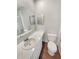 Clean bathroom with vanity, toilet and shower/tub combo at 2354 S Troy St, Aurora, CO 80014