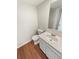 Simple half bathroom with toilet and sink at 2354 S Troy St, Aurora, CO 80014