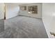 Bright bedroom with new carpet and ample natural light at 2354 S Troy St, Aurora, CO 80014