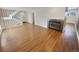 Spacious living room with hardwood floors and a fireplace at 2354 S Troy St, Aurora, CO 80014