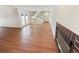 Living area with hardwood floors, fireplace, and access to a patio at 2354 S Troy St, Aurora, CO 80014
