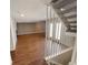 Spacious living room with wood-look floors and a fireplace at 2354 S Troy St, Aurora, CO 80014