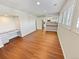 Bright living room with hardwood floors and kitchen views at 2354 S Troy St, Aurora, CO 80014