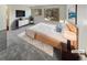 Main bedroom with large windows and a modern dresser at 2354 S Troy St, Aurora, CO 80014