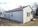 Side view of home showing siding, windows, roofline, and ladder resting against the building at 914 La Farge Ave, Louisville, CO 80027